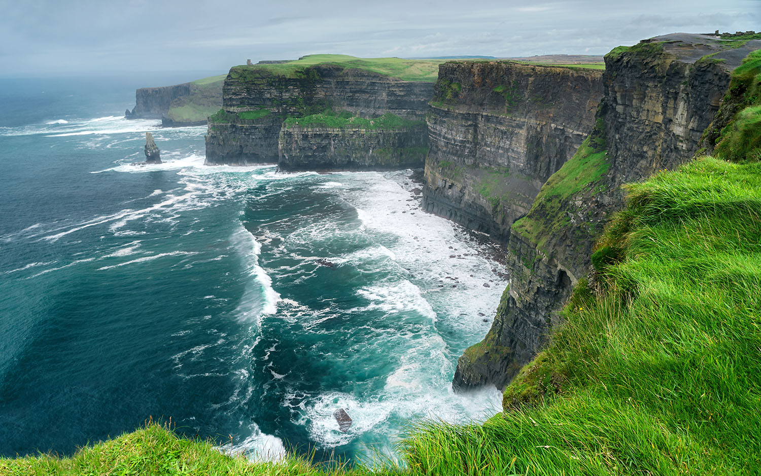 Spectacular view of famous Cliffs of Moher and wild Atlantic Oce
