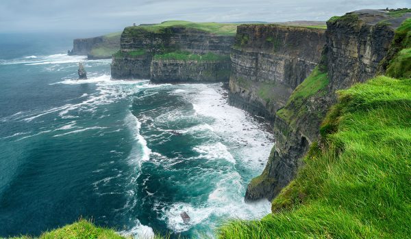 Spectacular view of famous Cliffs of Moher and wild Atlantic Oce
